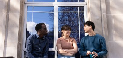 Students sitting on the window ledge